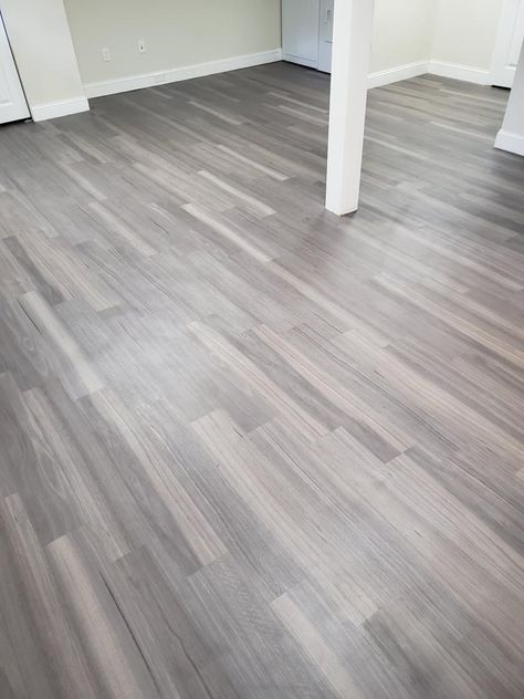 Contemporary gray vinyl plank flooring is not only gorgeous, but durable too! #karndean #homedecor #basementremodel #interiordesign #flooring #petfriendly #kidfriendly Luxury Plank Vinyl, Gray Vinyl Plank Flooring, Gray Vinyl Flooring, Vinyl Bathroom Flooring, Karndean Design Flooring, Nautical Bathroom Design Ideas, Vinyl Flooring Installation, Oak Staircase, Vinyl Flooring Bathroom