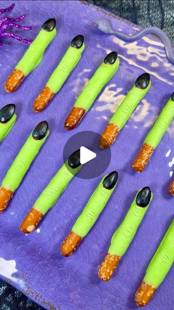 Genevieve LaMonaca on Instagram: "Witch Fingers🧙 Follow @chefgenevieve for 50 halloween recipes #halloweenfood #halloweeninspo #witchfingers #halloweenfoodideas

Ingredients:

10 pretzel rods
20 whole almonds (*see tip below)
10oz white melting wafers
1 tsp green gel food coloring
2 Tbsp powder sugar
1 tsp water 1 drop black food coloring

Directions:
Cut pretzel rods in half. Melt chocolate according to package directions (Melt for 45 seconds in the microwave then stir, then return to the microwave in 15 second increments stirring in between until fully melted. Do not overcook or the chocolate will clump)

Dip pretzel rods cut side down into chocolate. While still wet add an almond as the nail.

For the Black icing polish, mix powder sugar with water and black food coloring. Use a small Halloween Wafer Cookies, Witch Finger Pretzel Rods, Pretzel Witch Fingers, Mummy Pretzel Rods, Witches Fingers Pretzels, Halloween Sides For Party, Witch Finger Pretzels, Chocolate Dipped Pretzel Rods Halloween, Halloween Dipped Pretzel Rods