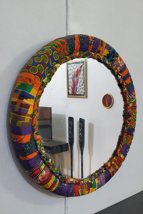 Motorcycle tire-inspired wall decor crafts Ankara Home Decor Ideas, Ankara Wall Decor, African Room Decor Ideas, African Print Decor, Diy African Decor, African House Decor, African Decor Living Room, Draps Design, Africa Decor