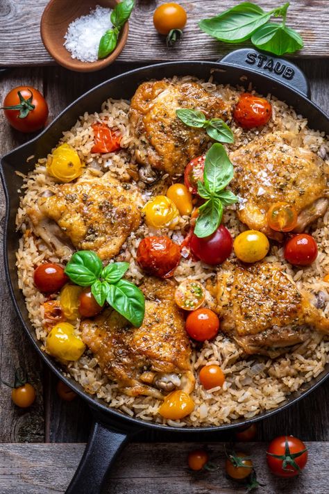 Burst Cherry Tomato Chicken and Rice Skillet Chicken And Cherry Tomato Recipes, Tomato Chicken And Rice, Cherry Tomato Chicken, Wandering Chickpea, Chicken Thigh And Rice Recipe, Chicken And Rice Skillet, Pan Seared Chicken Thighs, Toasted Rice, Alpha Gal