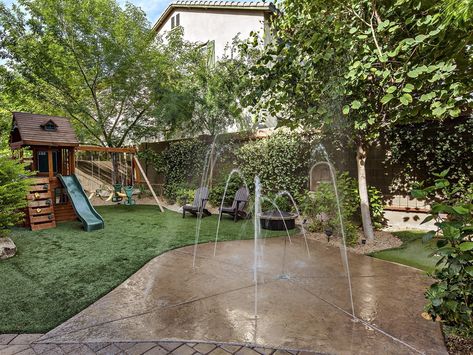 Backyard Park Ideas, Diy Waterslide Backyard, Splash Pad Ideas, Diy Backyard Splash Pad, Diy Splash Pad For Kids Backyard Ideas, Splash Pad Backyard, 1 Acre Backyard Ideas, Backyard Tanning Area, Pool With Splash Pad