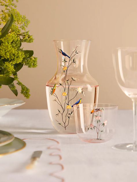 The classic midcentury Alpha tumbler in mouth-blown muslin glass has been reimagined by one of London’s most fascinating illustrators, Tatiana de Nicolay. Her Garden of Paradise design adds an equally delicate landscape featuring a crowned bird on a fruit-bearing tree, all hand-painted at the Lobmeyr workshop. Garden Of Paradise, Fruit Bearing Trees, Room Maker, Paradise Garden, Flower Room, Crystal Water, Bohemian Crystal, Pink Garden, Crystal Glassware