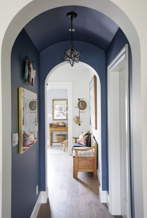 Creating a feature out of a hallway by barrel vaulting the ceiling and creating an archway at each end. Painting it deep blue and including a star-shaped pendant create a bit of theatricallity. Accent Archway, Curved Archway In Home, Beadboard Trim, Archways In Homes, Easy Living, White Rooms, Carpet Tiles, Summer Decor, White Walls