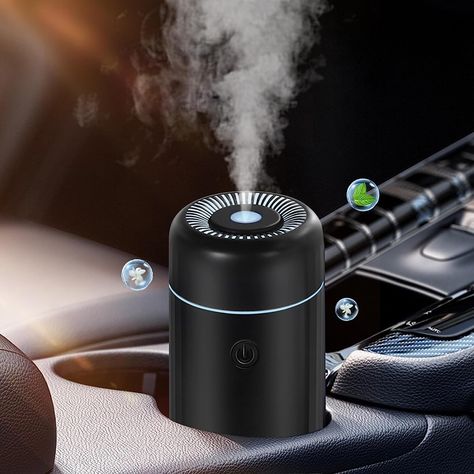 Our oil diffuser is designed to perfectly fit most vehicle cup holders. It provides 3-4hrs of constant misting or 6-8hrs of intermittent cool misting. This electric car scent diffuser provides 7 colorful auto cycle LED lights as an atmosphere lamp or a perfect decor addition for cars, offices, bedrooms, etc. Our car essential oil diffusers are BPA free, and are not harmful to pregnant women or children. Defusers Home Decor, Diffusers For Essential Oils, Essential Oil Diffuser Humidifier, Travel Bedroom, Car Diffuser Essential Oils, Atmosphere Lamp, Usb Design, Scent Diffuser, Car Diffuser