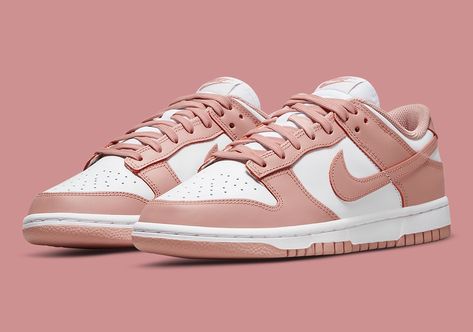 The Nike Dunk Low has already had a busy start to the year, and it’s still just January. New pictures have surfaced of a women’s-exclusive Nike Dunk Low Rose Whisper which joins a long list of planned hues. This pair brings back the classic two-toned style, but with a more feminine twist to an arrangement that’s been adored for a long time. To contrast the smoother quality and lighter tint of the whites underlying, “Rose Whisper” outfits the overlays’ slightly Cute Outfits With Nike Shoes, Woman Nike Shoes, Women’s Fashion Sneaker, Pink Nike Shoes Women, Nike Shoes Woman, Nike Dunk Low Rose Whisper, Dunk Low Rose, Nike Shoes Women Fashion, Nike Jordans