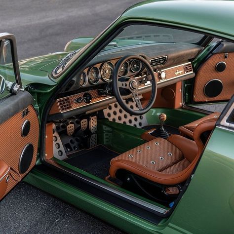 Singer Vehicle Design on Instagram: "Here’s the Redding commission.    Interior trimmed in Vivaldi with woven leather and nickel grommets.    Kauai Green Metallic exterior with ghosted stripes and Campfire Orange lettering.    #Singer #california #porsche" Porsche Singer Interior, Vintage Porsche Interior, Car Custom Interior, Orange Luxury Aesthetic, Orange Car Interior, Green Car Interior, Miata Interior, Interior Car Aesthetic, Restomod Cars