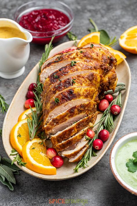 Here's a recipe for Tandoori Turkey Breast that's a juicy, crispy-skinned, star of the table main dish prepared in the Instant Pot or Oven. #tandooriturkeybreast #instantpotrecipes #Thanksgivingrecipes Turkey Breast Instant Pot, Turkey Breast Thanksgiving, Oven Roasted Turkey Breast, Marinated Turkey, Tandoori Recipes, Hot Spices, Party Food Dessert, Cranberry Chutney, Oven Roasted Turkey