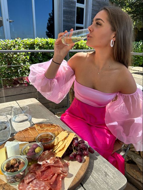 Girl drinking wine in cute pink outfit Wine Farm Outfit, Birthday Lunch Outfit, Lunch Outfit Summer, 2025 Wardrobe, Wine Farm, Lunch Outfit, Birthday Picnic, Birthday Lunch, Cute Birthday Ideas