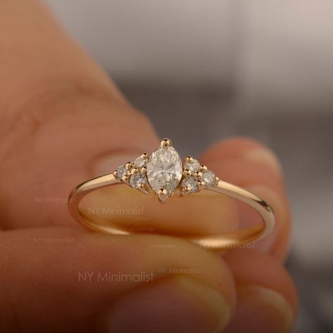 14K Gold Diamond Cluster Ring/ Genuine Round and Marquise Diamond Ring/ Unique Diamond Wedding Ring/ Minimalist Stackable Ring/ Gift For Her * SKU: SGR02730-48730  * Made to Order. * Gold Purity: 14K Solid Gold (stamped) * Custom Gold Color: Yellow, Rose, White Gold * Custom Gold Purity: 10K/14K/18K (Charges Apply) * Diamond 100% Genuine Diamond * Marquise Diamond Weight: 0.19 ct. * Round Diamond Weight: 0.09 ct. * Diamond Color: G-H * Diamond Clarity: SI1- SI2 * Diamond Cut: Marquise Cut / Round Cut  >> Product Measurements:- *  Ring Size: 3 to 10 (All sizes available) ✦ Size can be customized as per your request, please mention the required size in buyer notes (Charges may apply). ✦ Shipping We are located in USA NY, We ship worldwide by USPS, UPS, and FedEx. Since most items are 'made t Gold Wedding Rings Minimalist, Dainty Wedding Ring Gold, Simple Stacked Rings, Cute Small Engagement Rings, Engagement Rings Gold Dainty, Wedding Ring Delicate, Tiny Wedding Rings, Unique Engagement Rings Not Diamond, Wedding Rings Women Gold