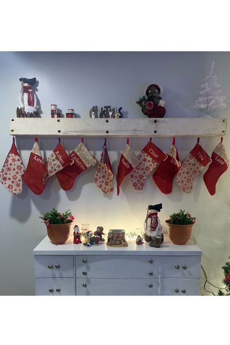 Whitewash floating shelf for christmas stockings Christmas Stockings On Floating Shelf, Stocking Shelves, Floating Shelf, White Wash, Floating Shelves, Christmas Ideas, Christmas Stockings, Baby Mobile, Floating