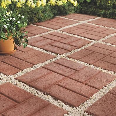 DIY Projects With Brick Pavers | Lowe's Brick Patio Garden, Pavers That Look Like Brick, Brick Deck Ideas, Brick Pavers Walkway, How To Lay Brick Pavers, Easy Brick Pathway, Brick Patio, Brick Walkway Diy, Solar Paver Lights Bricks