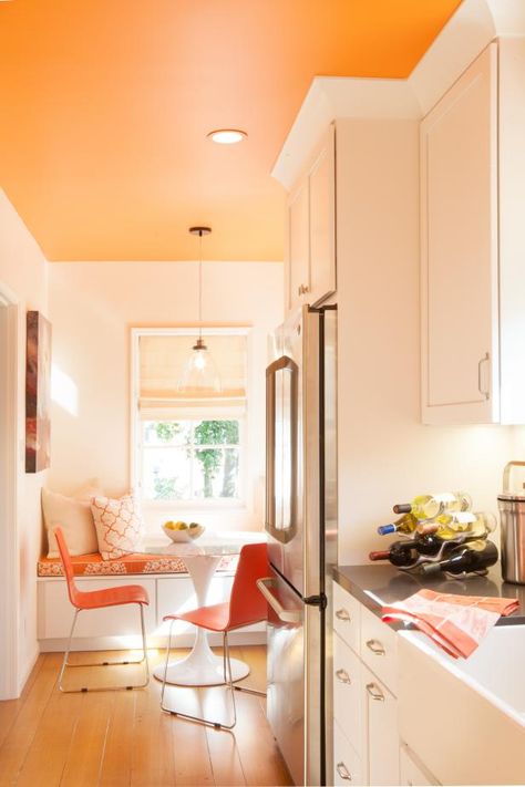 Orange And White Kitchen, Orange Accent Walls, Orange Rooms, 1920s House, Grey Countertops, Orange Kitchen, Nordic Living Room, Wallpaper Home Decor, Brown Kitchens