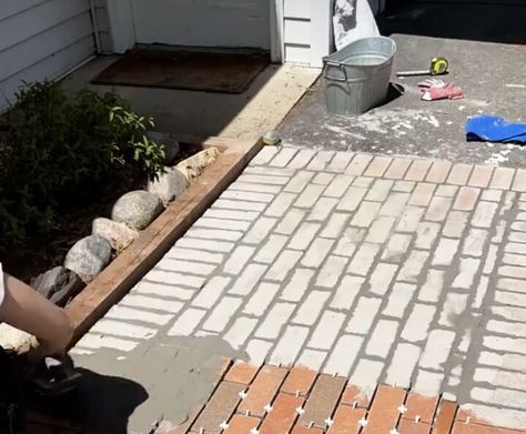 I wanted to add some curb appeal to our front steps, so I added some brick pavers over my existing concrete pathway...yes, that's right...OVER the existing sidewalk. Here is what our walkway looked like before...boring beat up concrete. First, I roughly laid out the brick pattern I would use. Then I mixed grout up in a bucket. Make sure to use exterior grade grout. Then I started to lay the grout with a thinly notched trowel. Then I put a small amount of grout on each brick and… Paver Sidewalk, How To Lay Pavers, Concrete Pathway, Epoxy Grout, Concrete Path, Concrete Cover, Concrete Walkway, Walkways Paths, Exterior Inspiration