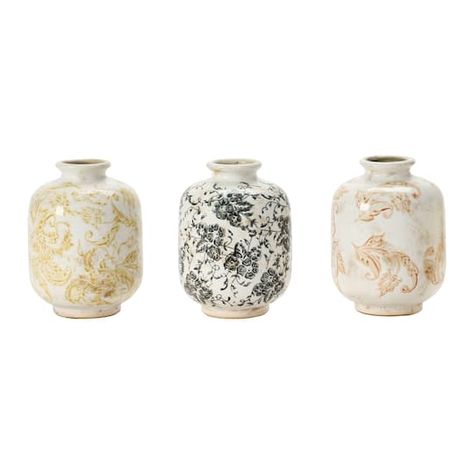 "Purchase the 6\" Terra Cotta Vase Set at Michaels. com. This beautifully artful terracotta vase with transferware pattern will be a charming décor accent. This%20beautifully%20artful%20terracotta%20vase%20with%20transferware%20pattern%20will%20be%20a%20charming%20d%C3%A9cor%20accent.%20It%20will%20be%20a%20gorgeous%20accent%20for%20a%20living%20room%2C%20den%2C%20bedroom%2C%20or%20entryway%20that%20flawlessly%20complements%20a%20wide%20range%20of%20design%20themes.%20Add%20interest%20to%20any%2 Terra Cotta Vase, Terracotta Vase, Ancient Pottery, Blue And White Vase, Design Themes, Black Vase, Creative Co Op, Boho Patterns, White Vases