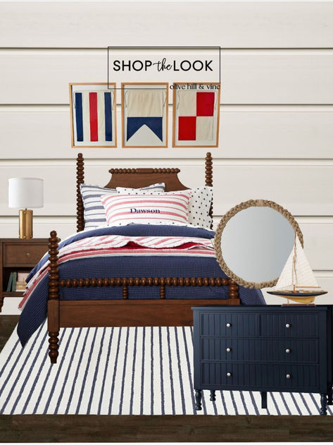 Bedroom with nautical theme. Boat flag artwork, red and blue color palette with wood detailing. Nautical rope mirror and rivet table lamp. Nautical Headboard, Red White And Blue Bedroom, Americana Bedroom, Lake Apartment, Nautical Boy Room, Sailboat Sculpture, Flag Artwork, Nautical Bedding, Nautical Flag