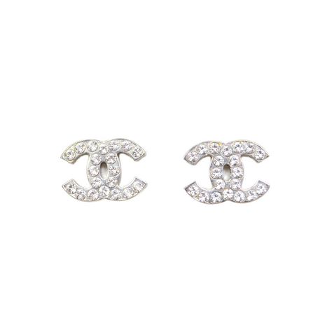 CHANEL Silver & Crystal CC Stud Earrings | From a unique collection of vintage stud earrings at https://www.1stdibs.com/jewelry/earrings/stud-earrings/ Clean Gold Jewelry, Jewelry Staples, Gold Jewelry Simple, Chanel Earrings, Expensive Jewelry, Chanel Jewelry, Jewelry Lookbook, Silver Crystal, Dream Jewelry