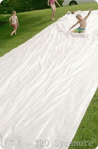 Homemade Slip N Slide - Film-Gard 10 x 25, 4 Mil Plastic Sheeting, weights on the corners, No-Tears Baby Shampoo to make it slippery, and a hose Homemade Slip And Slide, Outdoor Water Games, Yard Ideas Cheap, Slip N Slide, Diy Playground, Garden Ideas Cheap, Games Diy, School Starts, Diy Water