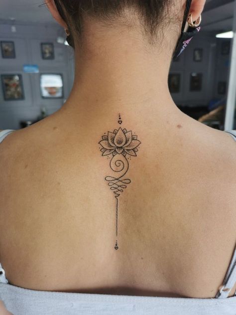 195+ Meaningful Unalome Tattoo Ideas (2023) - TattoosBoyGirl Strength Neck Tattoo, Tattoo Designs Taurus, Lotusblume Tattoo, Flower Spine Tattoos, Spine Tattoo Ideas, Tato Dengan Makna, Tattoos Infinity, Unalome Tattoo, Om Tattoo