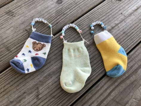 Baby Sock Ornaments, Baby Ornaments Diy, Sock Ornaments, Diy Baby Socks, Sock Ideas, Homemade Christmas Ornaments, Keepsake Crafts, Mint Tins, Sock Crafts