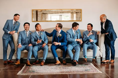 Medium Blue Groomsmen Suits, Blue Suit Groomsmen Wedding, Wedding Party Blue Suits Color Schemes, Heather Blue Suit Wedding, Navy And Copper Groomsmen, Blue Suit Groomsmen And Bridesmaids, Groom Blue Suit Groomsmen Khaki, Brown And Blue Groomsmen Attire, Navy Groom And Groomsmen