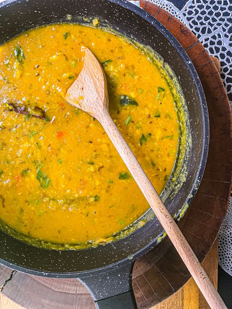 A simple, healthy split yellow lentil (daal) recipe prepared with aromatics, seasoned with tomatoes and garlic, and flavored with spiced oil known as Tadka. Daal Tadka, Lentil Dhal, Lentils Recipe, Toor Dal, Plain Rice, Yellow Lentils, Pigeon Peas, Fenugreek Leaves, Turmeric Powder