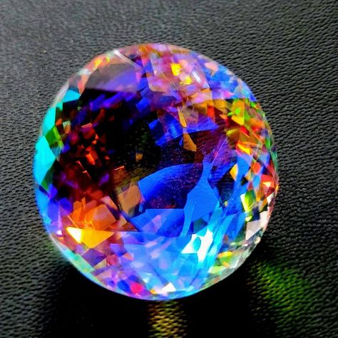 Multi Color Mystic Topaz Lab Created  Specimen - Topaz Shape - Round Color - Mix  Dimensions - L x W  x  D - 23.5x 23.4 x 19 mm Approx  We are Wholesale Supplier of all type of Gem Stones, precious, semiprecious stones. We also supply Gemstone as per your Requirement and Design. Weight, Design, Stones, Stones size can be changed as per requirement of buyer. Loosegems&Co About Us We are Wholesale Supplier of all type of Gem Stones, precious, semiprecious stones. We also supply Gemstone as per your Requirement and Design. Weight, Design, Stones, size can be changed as per requirement of buyer. Shipping Policy Our delivery time is 13-15 days after dispatching the product depending on the location. Handling Time 2 Business day after receiving the clear payment NOTE :- Import duties, taxes and Types Of Gems, Mystical Jewelry, Magical Stones, Mystic Quartz, Rainbow Gemstones, Beautiful Rocks, Color Mix, Minerals And Gemstones, Mystic Topaz