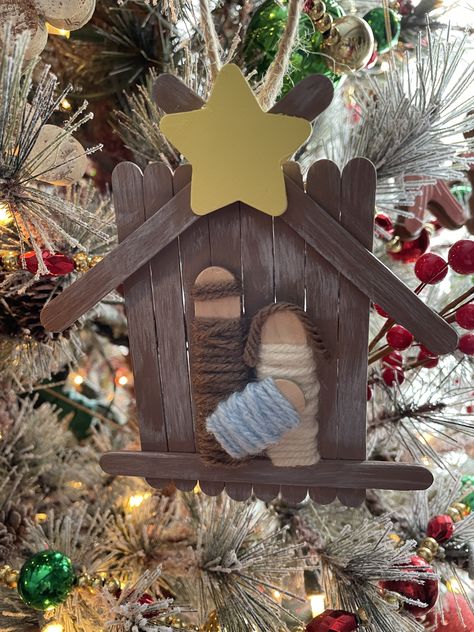 Nativity Popsicle Stick Craft, Manger Popsicle Stick Craft, Cinnamon Stick Nativity, Pop Cycle Stick Christmas Crafts, Mangers Christmas Diy, Popsicle Stick Sled Ornament, Popsicle Stick Manger Craft, Craft Stick Christmas Ornaments, Jaslice Božićne