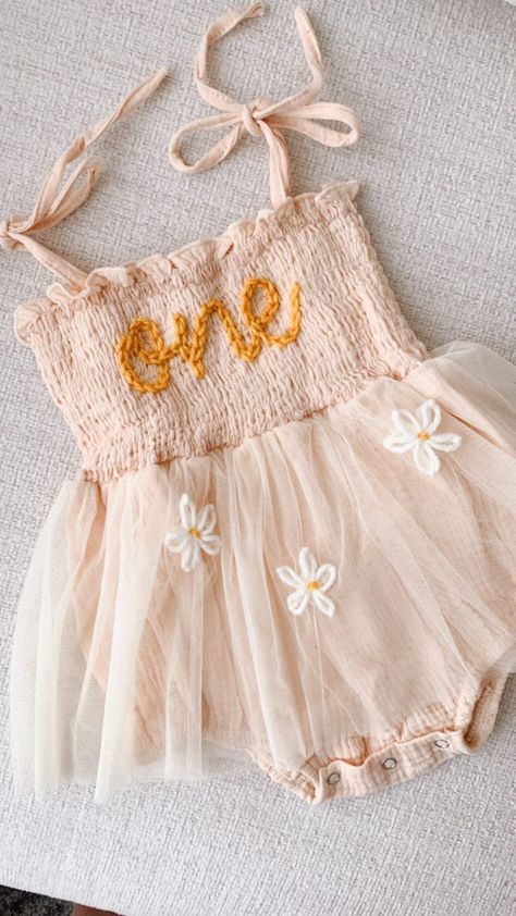 One Romper First Birthday Outfit First Birthday Romper Hand-embroidered One Romper with daisy flowers Yellow One A Year In Bloom First Birthday, Isn’t She Onederful Birthday Daisy, Wild Flower First Birthday Photoshoot, Wildflower First Birthday Outfit, Blooming One Birthday Party, Dainty First Birthday, 1st Birthday Girl Outfit Ideas, Spring One Year Old Birthday Party, Daisy Flower First Birthday