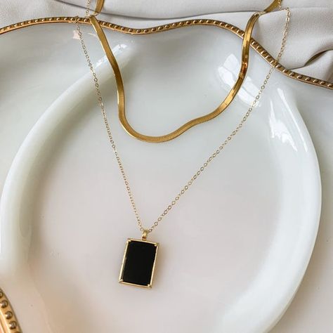 HIGH QUALITY 14k GOLD FILLED BLACK ONYX NECKLACE | Dark Matter Black Onyx Necklace | gold filled | layering necklace | tag pendant | 14k gold | 18k gold | cable chain | herringbone | natural gemstone*FREE SHIPPING** tarnish resistant, lead and nickel free necklaces * * Buy the set and get 8% DISCOUNT *STUDIO TWENTY NINE "DARK MATTER" NECKLACE SETDETAILS:Materials & Style:• Closure: Lobster clasp• Black onyx natural gemstone set in 14k gold filled rectangle pendant on 14k gold filled cable ch Necklace Set Gold, Black Onyx Pendant, Onyx Pendant, Black Onyx Necklace, Gold Filled Necklace, Onyx Jewelry, Buy Necklace, Onyx Necklace, Gold Necklace Set