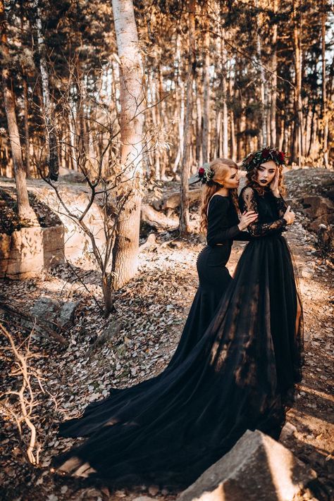 Black wedding dresses Black Wedding Dress In Mountains, Lesbian Wedding Black Dress, Black Witchy Wedding Dresses, Lesbian Halloween Wedding, Witchy Lesbian Wedding, Gothic Lesbian Wedding, Black Wedding Dress With Bridesmaids, Simple Black Wedding Dress, Witchy Wedding Dress