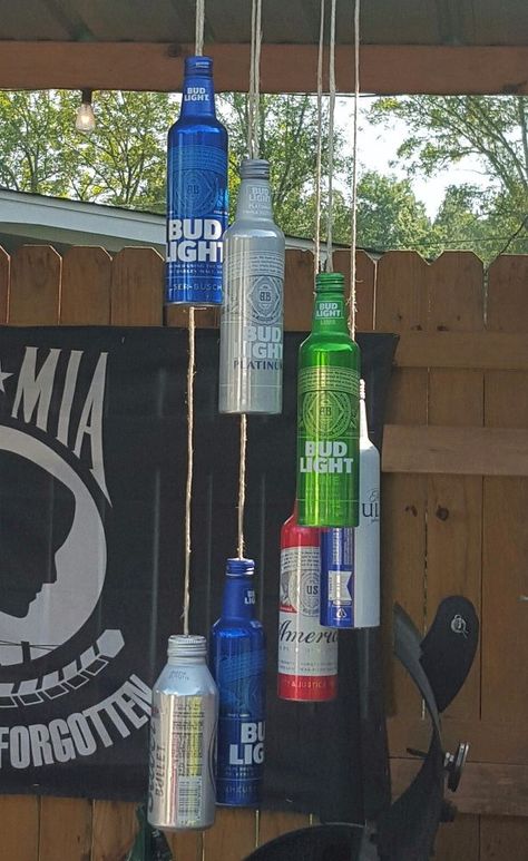 You might want to start saving empty tin cans when you see what this woman made for her porch! Soda Can Wind Chimes, Bottle Windchimes Diy How To Make, Liquor Bottle Wind Chimes, Diy Recycle Bottles, Beer Bottle Decor, Walmart Crafts, Beer Can Art, Fishing Lure Windchime, Beer Bottle Crafts