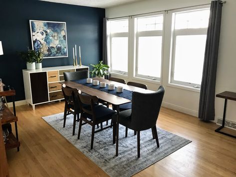 Dining room remodel mid century modern navy blue accent wall Navy Feature Wall Dining Room, Navy Blue Accent Wall, Dining Room Feature Wall, Blue Accent Wall, Blue Feature Wall, Dining Room Navy, Navy Accent Walls, Dark Brown Furniture, Moody Kitchen