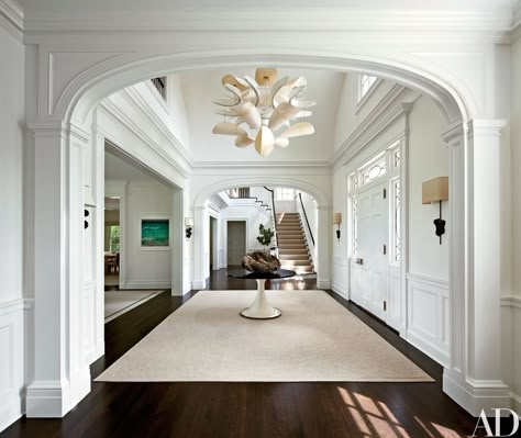 Magnificient entrance hall.  D.Martin Modern Colonial, Modern Entrance, Foyer Decorating, Foyer Design, Wooden Floors, Colonial Revival, Entrance Hall, Classic Interior, House Entrance