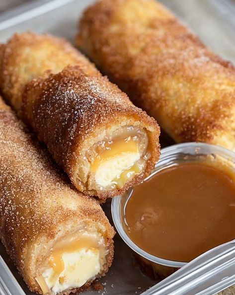 Indulge in Cheesecake Egg Rolls 🧀 A fun and easy dessert recipe that combines creamy cheesecake filling wrapped in a crispy egg roll wrapper. Perfect for any occasion! #cheesecake #dessert #easyrecipe Dessert Egg Roll Recipes, Dessert Egg Rolls Recipe, Eggroll Wrapper Recipes, Cheesecake Egg Rolls, Egg Roll Wrapper, Wonton Wrapper Recipes, Rolls Recipe Easy, Egg Roll Filling, Delight Dessert