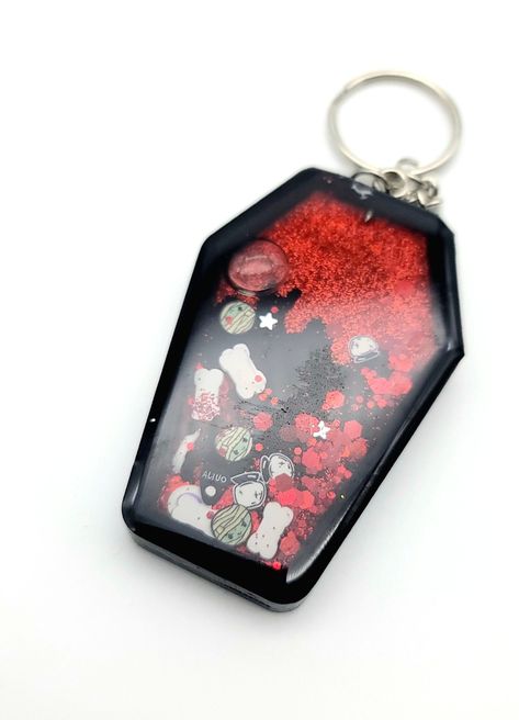 Red glitter blood drips in the background of this cute little black coffin shaker Keychain.  Handmade so they will be different includes shaker contents.  Can be made in other colors just send me a message. Coffin Keychain, Goth Resin, Halloween Keychain, Shaker Charm, Halloween Themed Gifts, Shaker Keychain, Kawaii Keychain, Goth Kawaii, Blood Drip