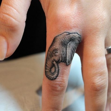 Chest Tattoo Elephant, Elephant Finger Tattoo, Origami Elephant Tattoo, Butterfly Tattoo On Chest, Men Finger Tattoos, Snake Tattoos For Women, Tattoos For Women Chest, Chest Tattoo For Women, Women Chest Tattoo