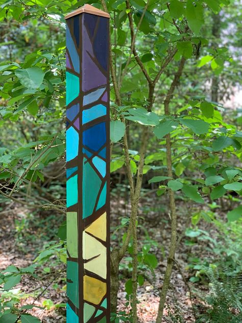 UNC Charlotte Botanical Gardens' Painted Art Pole Trail in May Peace Posts Garden, Tall Yard Art, Garden Poles Designs, Mosaic Totem Poles Yard Art, Peace Poles Ideas Garden Art Diy, Painted Poles Garden Art, Garden Poles Painted Diy, Mosaic Garden Totem Poles, Peace Poles Ideas Garden Art