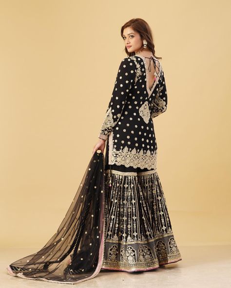 🖤Black Gharara set with Gold Handwork, Stone and Zari Embroidery and Subtle Pink Detailings at the Borders.🌺 . . Dazzle at festivals and special occasions in a black gharara! Elevate your style with intricate embroidery and delicate detailing, adding a touch of regal elegance to your ensemble. Pair it with statement jewelry and embellished footwear to complete the look. Channel sophistication and grace with this timeless attire that exudes cultural richness. Stand out in the crowd and make a ... Black And Gold Gharara, Embellished Footwear, Gold Gharara, Black Gharara, Regal Elegance, Zari Embroidery, Intricate Embroidery, Pakistani Dresses, Statement Jewelry