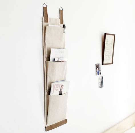 For those who like DIY storage ideas without the frills, this Minimalist DIY Magazine Holder is the perfect solution. Free sewing patterns like this make life a little bit simpler and make room for a whole lot of extra breathing room. Diy Mail Organizer, Wall Mounted Kitchen Storage, Diy Magazine Holder, Diy Mail, Mail Organizer Wall, Video Set, Wand Organizer, Terrace Ideas, Cute Dorm Rooms