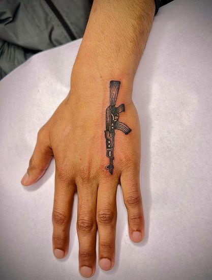 Simple Ak47 Tattoo Ak 47gun Tattoo, Simple Hand Tattoo, Tattoo Ak47, Ak Tattoo, 47 Tattoo, Ak47 Tattoo, On Hand Tattoo, Baddie Tattoos, Hand Tatto