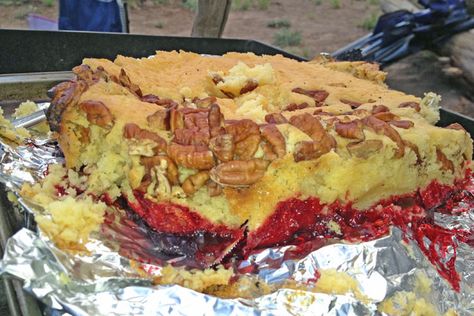 Looking for a camping dessert? Try this campfire spin on the classic Dump Cake recipe that is made in the dutch oven. It's much tastier than baked at home. Dutch Oven Dump Cake, Camping Desserts, Dump Cake Recipe, Campfire Recipes, Dutch Oven Camping, Dump Cakes, Dump Meals, Camp Food, Dutch Oven Cooking