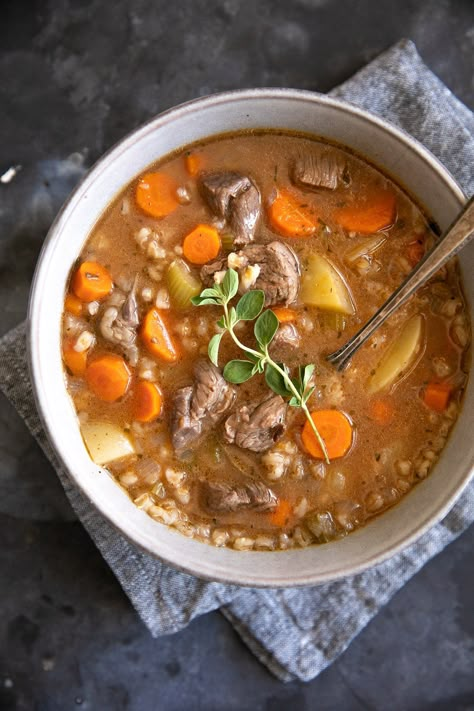 This Beef Barley Soup Recipe is hearty, rich, and deeply satisfying. Made with tender chunks of beef, nutritious vegetables, and chewy barley in a comforting beef and tomato broth. Beef Barley, Beef Barley Soup, Tomato Broth, Barley Soup, Ultimate Comfort Food, Fresh Garlic, Barley, Main Dish, Fresh Herbs