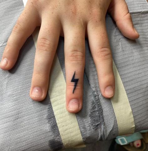 Lightning Bolt Finger Tattoo, Finger Tattoo Meaning, Finger Meaning, Middle Finger Tattoos, Lightning Bolt Tattoo, Tattoos With Deep Meaning, Bolt Tattoo, Finger Tattoo, Tattoos Women