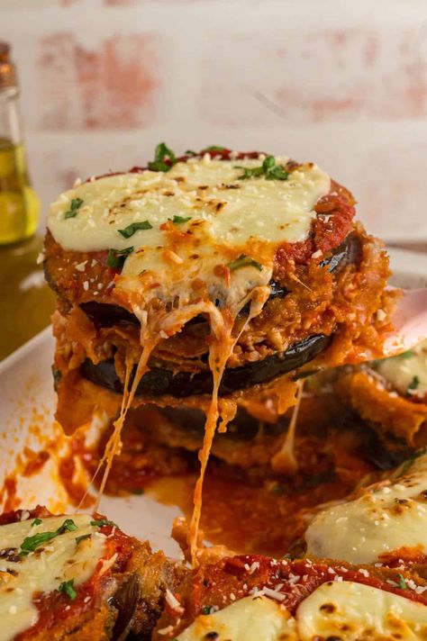 Layers of crispy fried eggplant, gooey cheese, and marinara sauce make this Eggplant Parmesan recipe an irresistible yet easy weeknight dinner. Serve over pasta or with salad and garlic bread. Best Eggplant Parmesan, Best Eggplant Parmesan Recipe, Eggplant Marinara, Fried Eggplant Recipes, Milanese Recipe, Eggplant Parmesan Recipe, Crispy Eggplant, Eggplant Parmesan Baked, Eggplant Recipes Parmesan