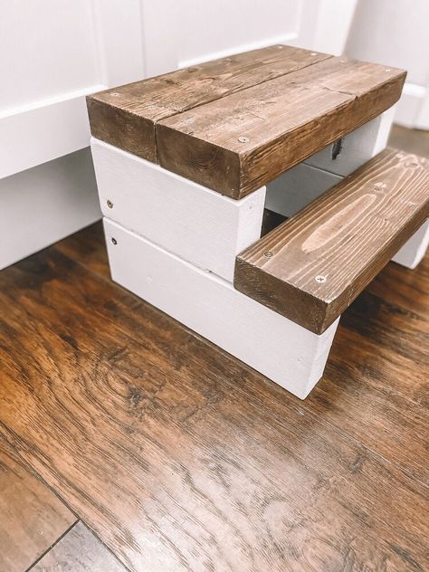 We had just recently remodeled our children's bathroom and we had a plastic step stool that just didn't match. Since we are turning our house into a "faux" farmhouse we have been making a ton of DIY wood projects. You can follow my Instagram with all the DIY's we have done @ourlitte_humblehome . So I decided to make a DIY step stool out of scrap 2x4 boards that we had in our barn.I am all for DIY projects and making things myself.   DIY Wooden Step Stool    What you will need to build… How To Make A Step Stool, Things To Make With 2x4 Scraps, Diy Wooden Steps, Farmhouse Step Stool, 2x4 Step Stool Diy, Scrap 2x4 Crafts, Crafts With 2x4 Scraps, Diy Wooden Stool, 2x4 Stool