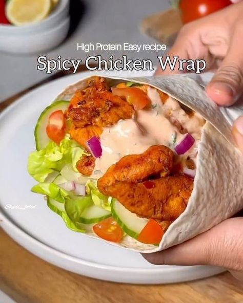 Munchy Moment on Instagram: "High protein Spicy Chicken wraps !! by @shadi_faleel  Make high protein, low calorie, Spicy Chicken wraps in less than 30 mins.. This recipe not only helps you with a healthy meal, it’s perfect for meal prepping & kids lunch box meals. A recipe perfect for the whole family..  You’ll need: 300g Boneless Chicken (cut into strips) 1 or 2 tbsp Olive oil 1 tsp Salt 1/2 tbsp Grated garlic (2 cloves) 1 tsp Chilli powder 1 tsp Cumin powder 1 tsp Chilli flakes 1 tsp Paprika 1/2 tsp Black pepper  For the spicy sauce 1/2 cup Low fat Greek yogurt 2 tbsp Sriracha hot sauce 1 tsp Grated garlic 1/2 tsp Salt 1/2 tsp Chilli flakes Juice of half a Lemon 2 tbsp Chopped coriander 🌿  To assemble I’ve used I’ve used wheat & white wraps which has only 183 calories per wrap) Lettuce Lunch Box Meals, Potato Cheese Bites, Spicy Chicken Wrap, Chicken Gyro Recipe, Kids Lunch Box Meals, Clean Eating Guide, Chicken Snacks, Tandoori Masala, High Protein Low Calorie