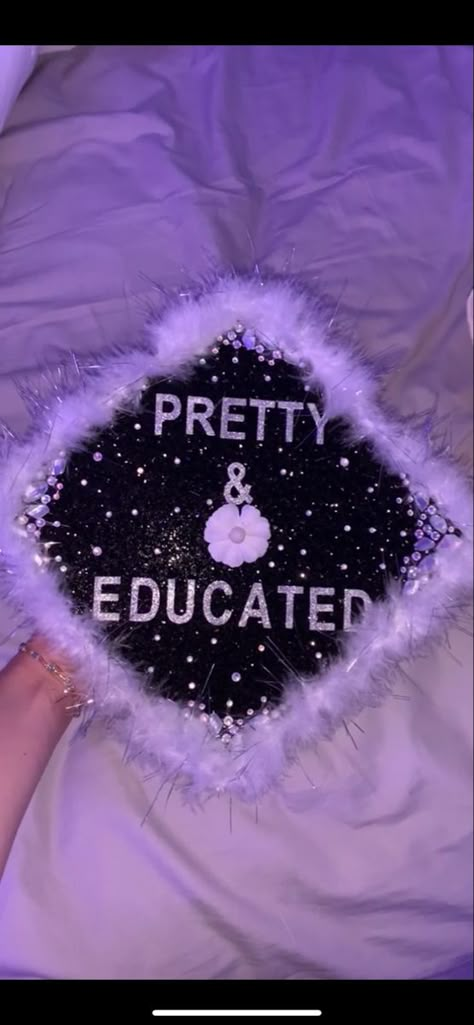 Caps And Gowns Decoration, Pretty And Educated Grad Cap, 2000s Graduation Cap, Graduation Cap Ideas Middle School, Fluffy Graduation Cap, Megan Thee Stallion Graduation Cap, Fur Graduation Cap, Graduation Cap Black Women, Graduation Cap Designs With Crown