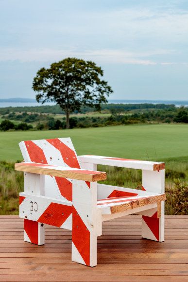 An Adirondack style outdoor chair built by artist Tom Sachs out of 2x6 boards painted with orange and white stripes to resemble road barricades Tom Sachs Furniture, Tom Sachs Art, Tent Ideas, Tom Sachs, Plywood Table, Haida Gwaii, Lawn Furniture, St Moritz, Weaving Art