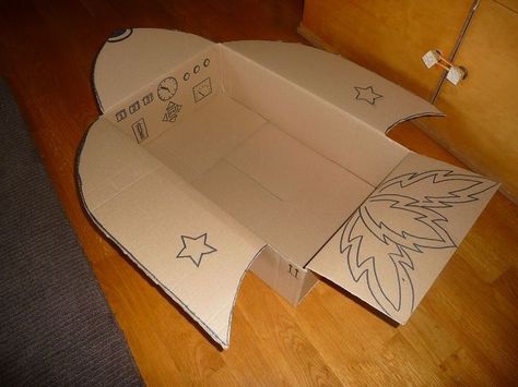 Diy Space Shuttle Cardboard, Cardboard Box Spaceship Diy, How To Make A Spaceship Out Of Cardboard, Spaceship Out Of Cardboard Boxes, Cardboard Spaceship Diy, Cardboard Spaceship, Primary School Activities, Cardboard Rocket, Space Activities For Kids