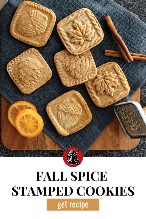 Fall Spice Stamped Cookies, get recipe! Six square stamped cookies with fall designs stamped into them on a blue napkin next to the pinecone design of the Nordic Ware Fall Forest Springerle Cookie Stamp. Surrounding the cookies there are orange slices and cinnamon sticks. Stamp Cookie Dough, Christmas Cookie Stamp Recipe, Nordic Cookie Stamps, Shortbread Cookies Stamped, Best Cookie Recipe For Stamping, Best Cookies For Stamping, Best Cookie Dough For Stamping, Cookie Recipes For Stamp Cookies, Cookie Dough For Stamped Cookies